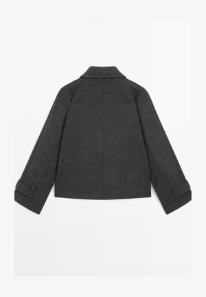 Gray wool coat featuring a classic collar, dropped shoulders, and cuffed sleeves with a textured finish. Back view shows clean lines and minimal design.