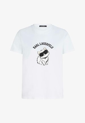 Camicia bianca a maniche corte con un gatto dei cartoni animati che indossa occhiali da sole neri e la scritta "KARL LAGERFELD" sopra il gatto.