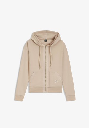 Beige zip-up hoodie van zachte stof, met een ritssluiting aan de voorkant, twee zakken en een geborduurd logo op de linkerzak.