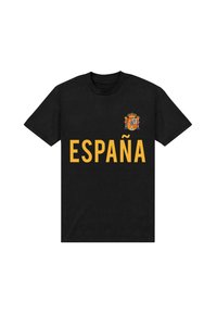 Sort t-shirt i sort bomuld med fed gul tekst "ESPAÑA" og et lille farvet våbenskjold på venstre brystområde.