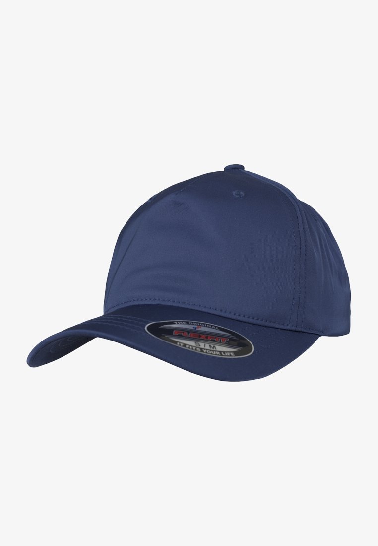 Navy blue baseball cap with a curved visor, made of smooth fabric. Features a Flexfit logo sticker on the visor. Seam detailing on the crown.