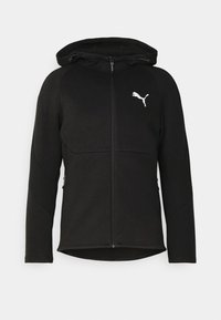 Sudadera con cremallera negra, con capucha, presenta un diseño texturizado, logo blanco en el pecho y bolsillos laterales. Tela suave con bordes elásticos.