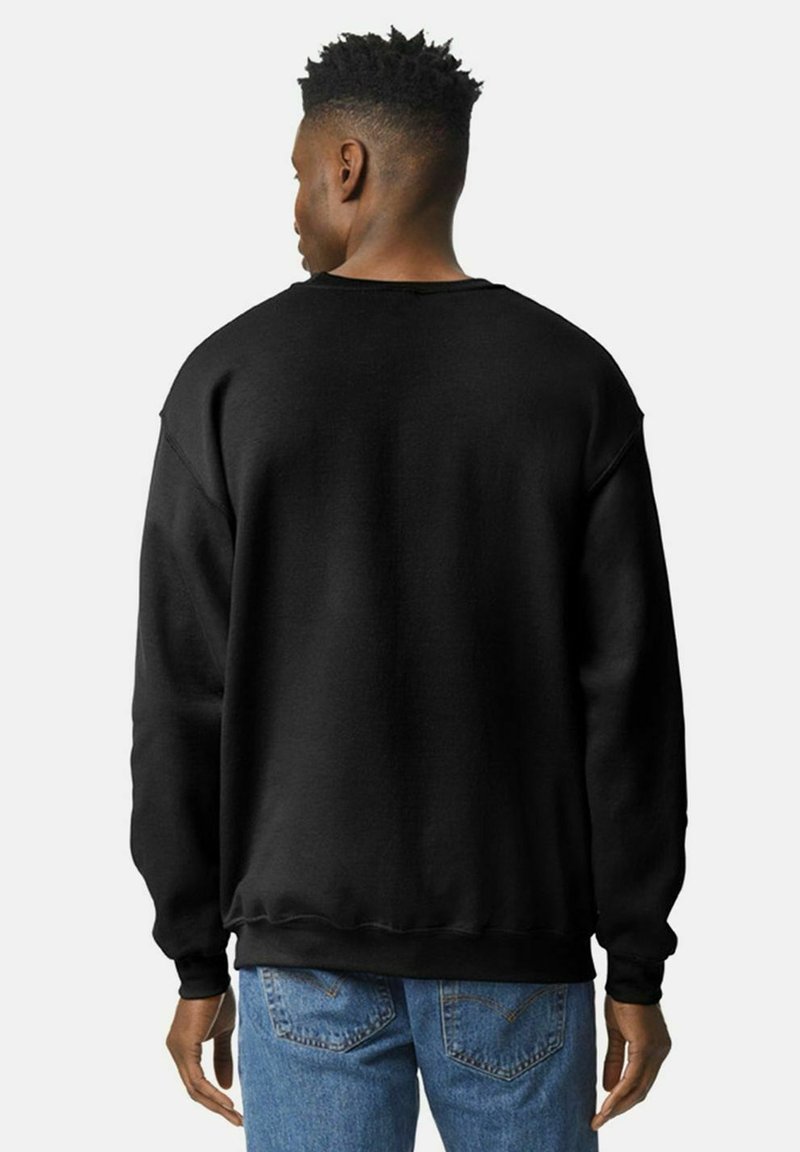Svart sweatshirt med en avslappet passform, ribbede mansjetter og hem. Mykt materiale, med rund hals og uten synlige logoer eller mønstre.