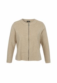 Beige damesjacket met lange mouwen, ronde kraag en centrale rits, gemaakt van zachte textuurstof, in een relaxed fit.