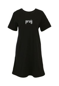 Robe en coton noire à manches courtes avec un texte graphique blanc "pray" sur la poitrine. Design simple avec une forme légèrement évasée au niveau de l'ourlet.