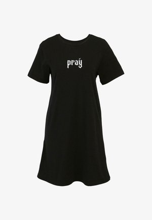 Musthave musträägiga musta värvi lühikeste varrukatega puuvillane kleit, millel rinnal on valge "pray" graafikatekst. Lihtne disain, mis on hemist kergelt laienev.