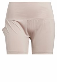 Vägrande sportshorts i beige färg, tillverkade av mjukt och elastiskt material. Har ett brett midjeband och en sidoficka för bekvämlighet.
