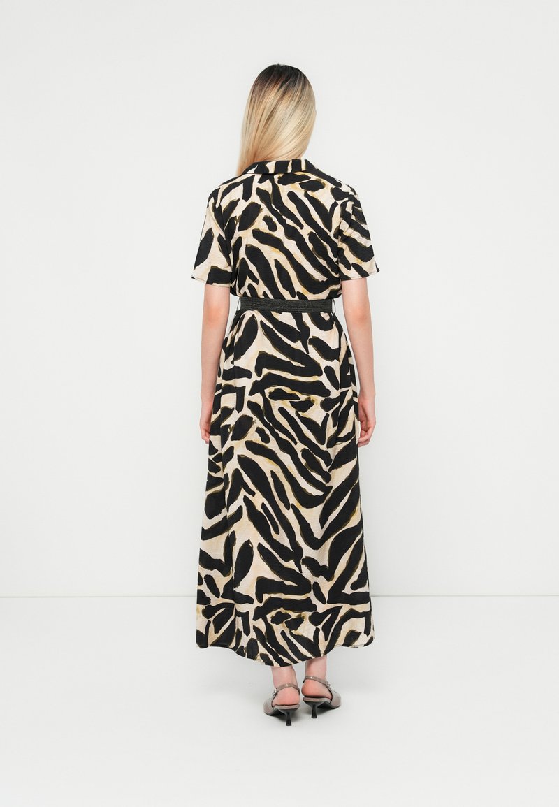 Robe Longue Noire Et Blanche Imprimé Abstrait, Manches Longues, Dos Nu - Taille 12