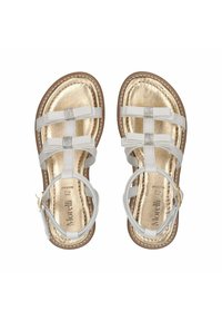 Witte sandalen met bandjes en een gouden metallic binnenzool, voorzien van kristalaccenten op de bandjes en een platte, flexibele zool.