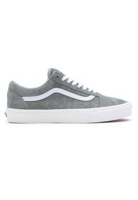 Grå mockasneakers med vita snören, vit sidrand och gummisula. Platt design med rund tå och låg profil.