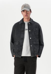 Marimekko POWERI UNISEX - Jakna iz džinsa - washed black
