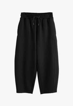 Sorte cropped joggingbukser med elastik i taljen og snøre, med sidelommer og løs pasform.