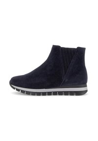 Bottines en suède bleu marine avec semelle en caoutchouc noir et gris striée et panneau latéral élastique pour un enfilage facile.