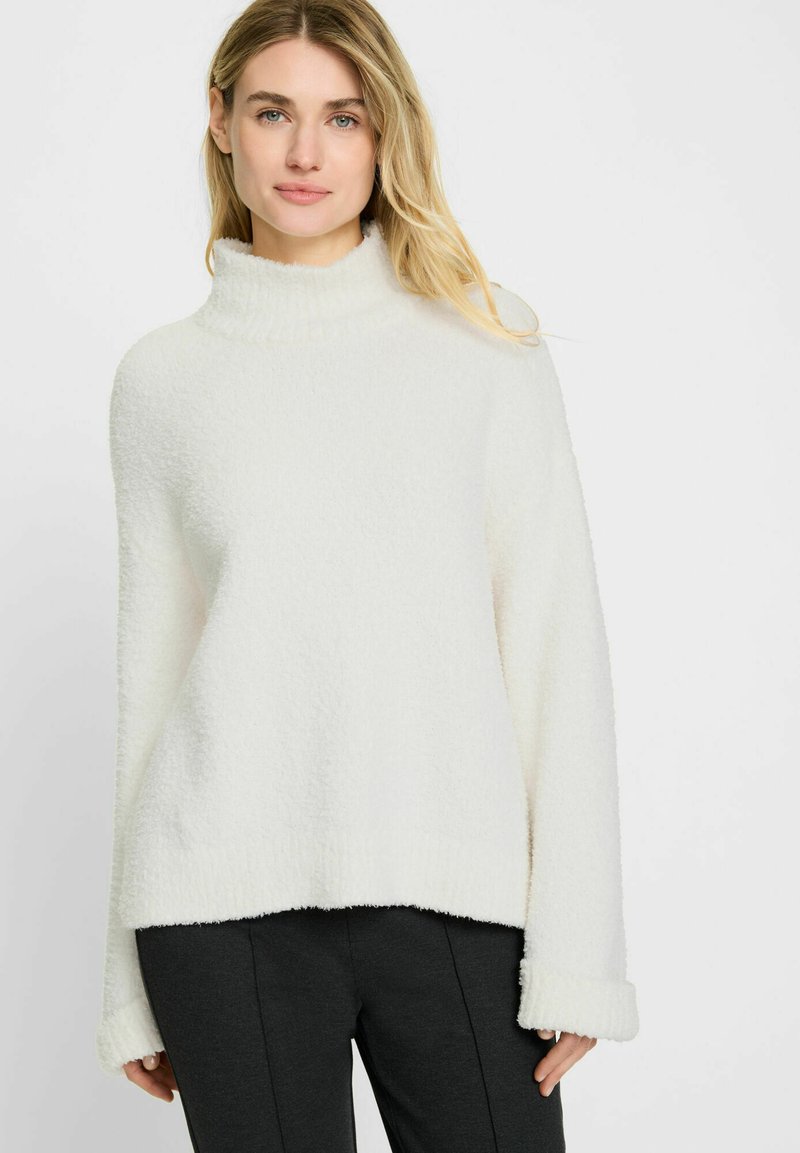 Weißer, gemütlicher Rollkragenpullover aus einem strukturierten, flauschigen Stoff. Verfügt über eine weite, lässige Passform und umgeschlagene Bündchen. Eignet sich gut für legere Anlässe.
