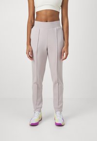Nike Performance HERITAGE PANT - Treniņtērpa apakšdaļas - platinum violet/barely volt