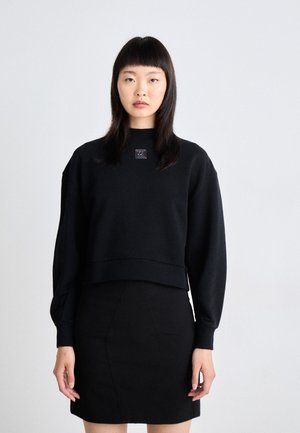 DEFLORINE - Sweatshirt - black