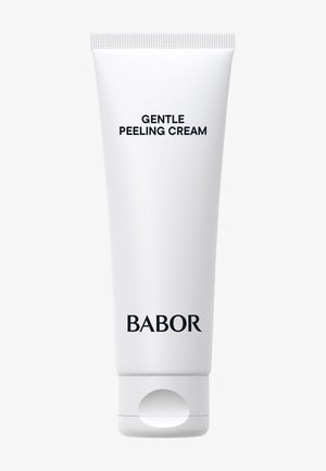 Tube blanche de crème exfoliante avec un capuchon à rabat, comportant un texte noir indiquant "CREME EXFOLIANTE DOUCE" et le logo "BABOR".
