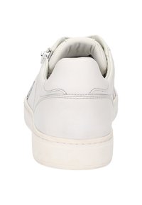 White leather sneaker with a rounded heel, padded collar, and a zip closure on the side. Textured sole with subtle stitching details.
