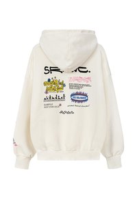 Kremowa bluza z kapturem ze sznurkiem, ozdobiona kolorowymi grafikami na plecach i rękawach. Wykonana z miękkiego materiału, o luźnym kroju.
