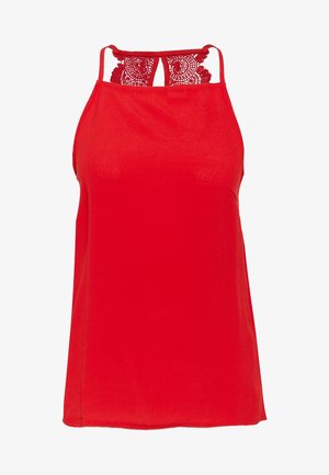 Haut rouge sans manches en tissu lisse, avec un détail en dentelle à l'arrière et des bretelles fines pour un dos ouvert.