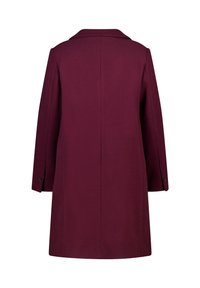 Manteau en laine bordeaux avec une silhouette droite, un large col et des manches longues. Comprend des poignets à boutons et une finition des coutures propre.