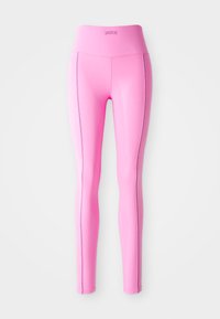 Leggings roses ajustés en tissu extensible, dotés d'une taille haute et de coutures latérales contrastantes. Texture lisse et sans motifs visibles.