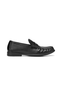 Black leather loafers featuring a stitched, rounded toe and a raised seam detail on the front. Low, flat rubber sole with no embellishments.
