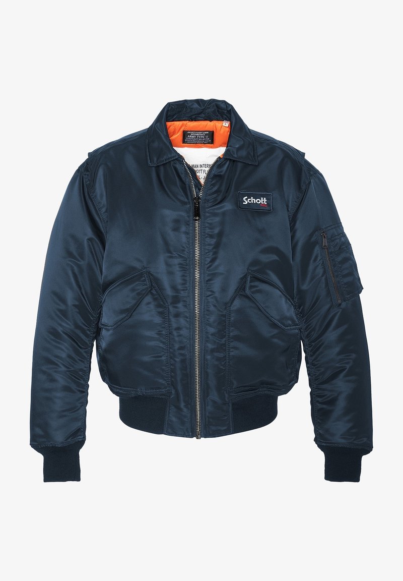Veste bomber bleu marine avec fermeture éclair à l'avant, deux poches à rabat, poignets et ourlet côtelés, et doublure orange à l'intérieur du col.