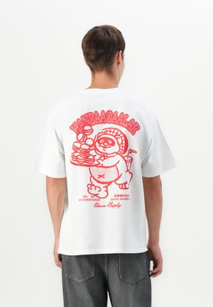 White cotton t-shirt featuring a red graphic of a bear holding hamburgers and a drink on the back; short sleeves and relaxed fit.