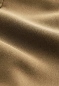 Next Ing - neutral brown