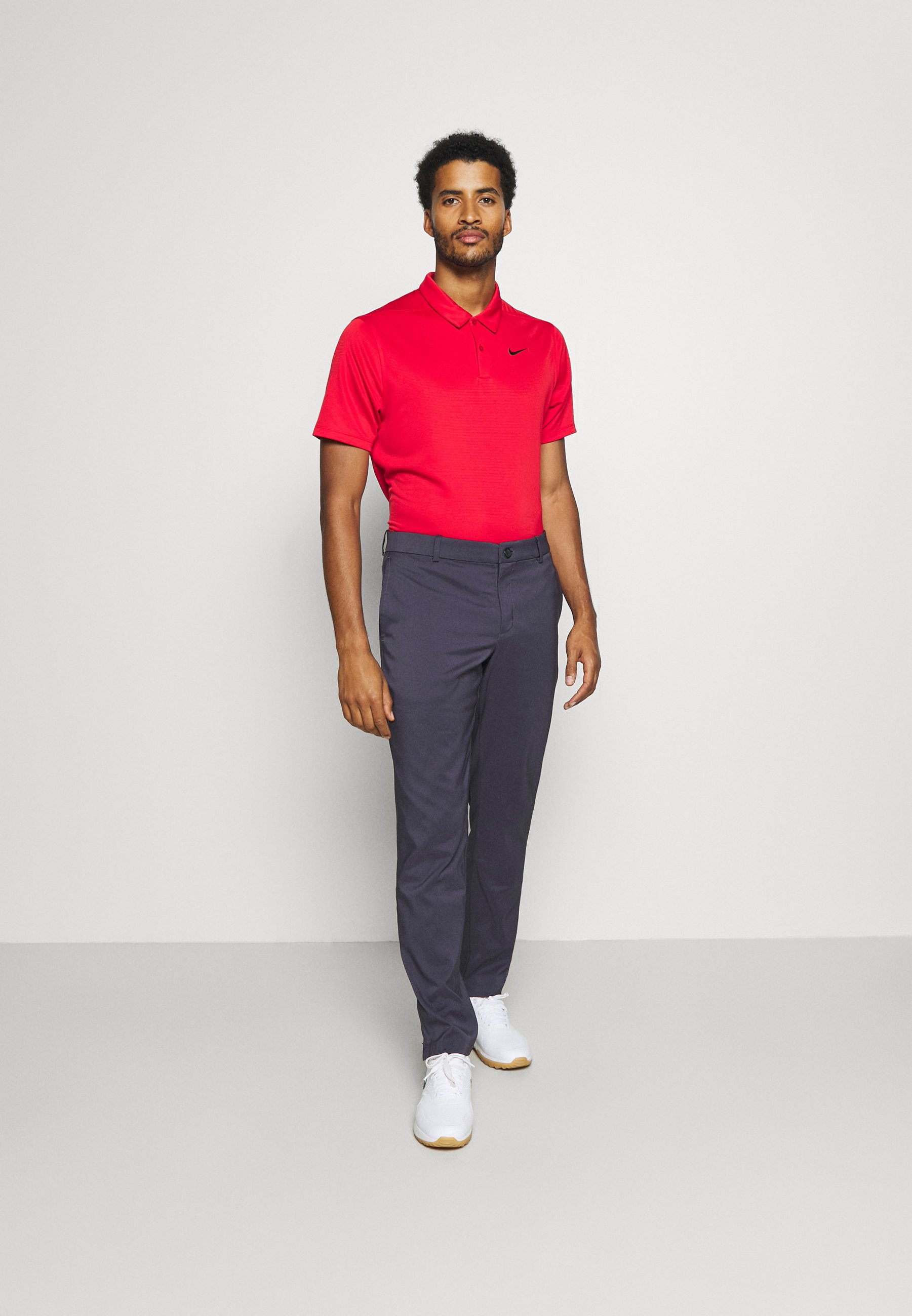Nike Golf NIKE FLEX HERREN-GOLFHOSE IN SCHMALER PASSFORM - Pantalones -  gridiron/gridiron/azul marino - Zalando.es