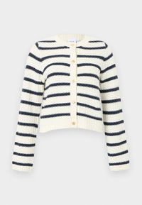 Ζακέτα με ρίγες σε κρεμ και ναυτικό μπλε, πλεκτή υφή, στρογγυλή λαιμόκοψη, κομμένη στο μήκος, με κλείσιμο μπροστά με κουμπιά και ριμπ μανσέτες και τελείωμα.