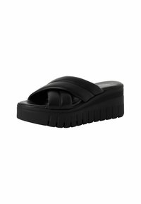 Sandalia de plataforma negra con diseño cruzado y tiras acolchadas. Suela gruesa y estriada para mayor tracción. Estética minimalista.