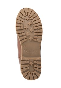 Bruine leren laarszool met een patroon van rubberen buitenzool. Heeft diepe groeven en kruisvormige patronen voor grip. Gemarkeerd met "TRAVELIN'" en maat 39.