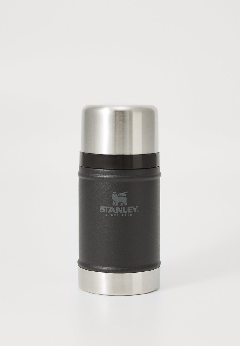 Black stainless steel thermos with a silver metal lid, featuring a logo and a textured grip for easy handling. Modern cylindrical design.
