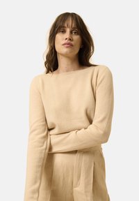 Unausgewählt, beige