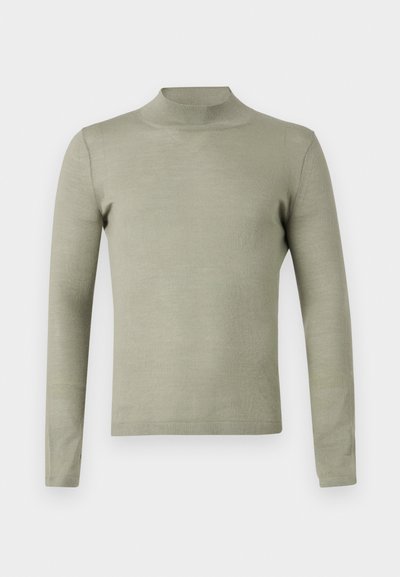 Μακρυμάνικος, pullover με ψηλό λαιμό σε απαλό, ανοιχτό πράσινο ύφασμα, με λεπτή εφαρμογή και λεπτοκαμωμένη υφή χωρίς σχέδια ή διακοσμητικά στοιχεία.