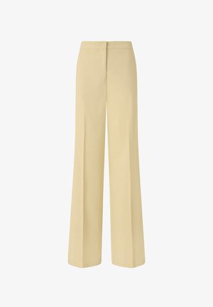 Bež hlače širokih nogavica s visokim strukom, s čista linija, bez džepova i glatke teksture. Dizajnirane za opuštenu kroj.