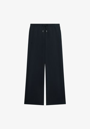 On, STUDIO PANTS WIDE - Pantalon de survêtement - black