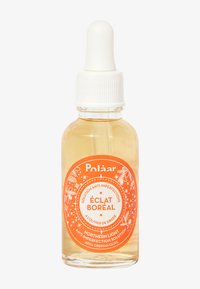 Braune Glasflasche mit einem weißen Tropfer und orangem Etikett. Das Etikett enthält Text und florale Designs und besagt "ECLAT BOREAL" sowie Produktdetails.