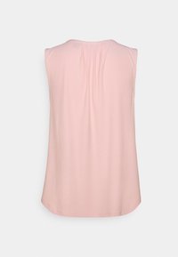 Sleeveless top in soft pink fabric, featuring a round neckline and a pleat detail at the back. Simple, relaxed fit with curved hem.