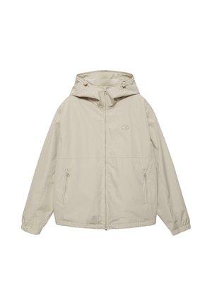 Beżowa kurtka z kapturem, zapinana na suwak z przodu, z dwoma kieszeniami na suwak, elastycznymi mankietami i małym logo na piersi.