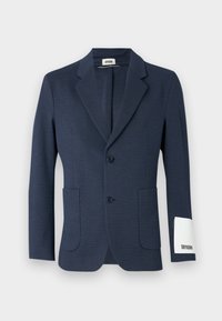 Navy blue blazer with a textured weave, two front pockets, two buttons, and white label on the sleeve, featuring a notched lapel design.