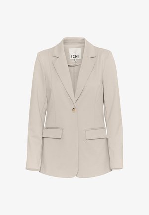 Blazer beige avec une coupe ajustée, doté d'une fermeture à un bouton, de deux poches avant et de revers crantés. Fabriqué à partir d'un tissu lisse.