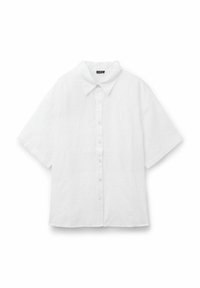 Camicia bianca a maniche corte con colletto a punte, caratterizzata da un motivo testurizzato. Chiusura frontale con bottoni e vestibilità rilassata. Tessuto in cotone.