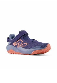Purple athletic shoe with a textured mesh upper, adjustable strap, and pink accents. It features a rugged sole for enhanced traction.