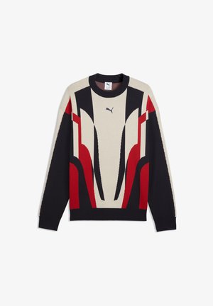 Sweter Puma z długim rękawem i okrągłym dekoltem, ozdobiony beżowymi, czarnymi i czerwonymi abstrakcyjnymi wzorami geometrycznymi na przodzie i rękawach.