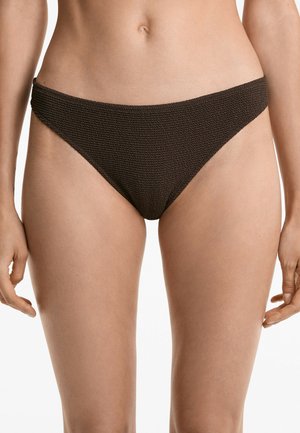 Brown bikini bottom featuring a textured fabric, low rise design, and moderate coverage on the sides. Simple and seamless edges.