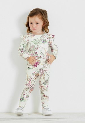 STANDARD - Leggings - Trousers - cream