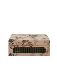 Floral-patterned fabric-covered speaker in soft beige, featuring a black mesh speaker grill with gold accents and a boxy design.